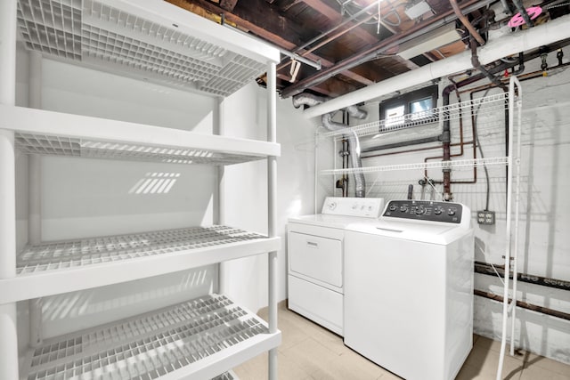 39-39 46th St, New York City, NY 11104 - washroom with laundry area and washer and clothes dryer