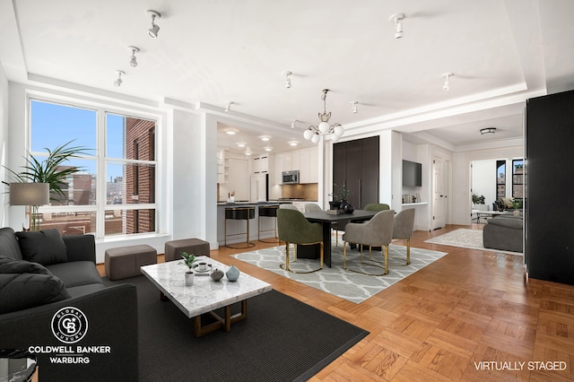 420 Riverside Dr Unit 12H, New York City, NY 10025 - living area with a chandelier and a raised ceiling