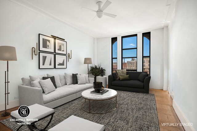 420 Riverside Dr Unit 12H, New York City, NY 10025 - living room featuring a ceiling fan and baseboards
