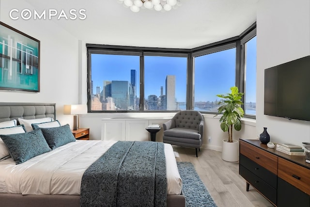 bedroom with light wood-style floors