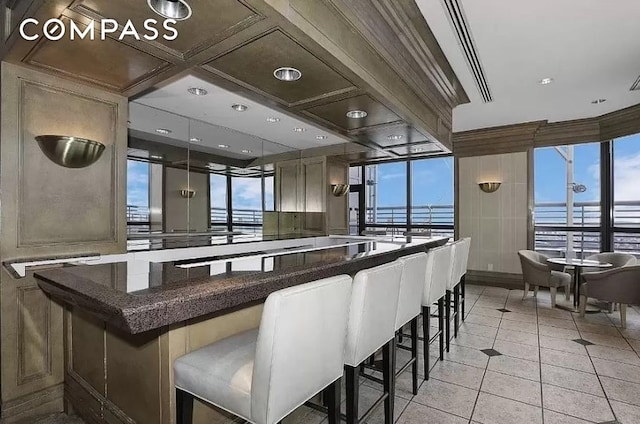 bar area with light tile patterned flooring