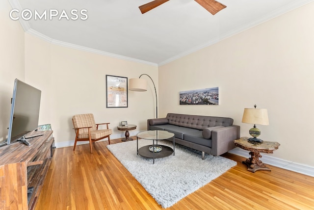 675 Academy St Unit 3A, New York City, NY 10034 - living area featuring crown molding, wood finished floors, baseboards, and ceiling fan