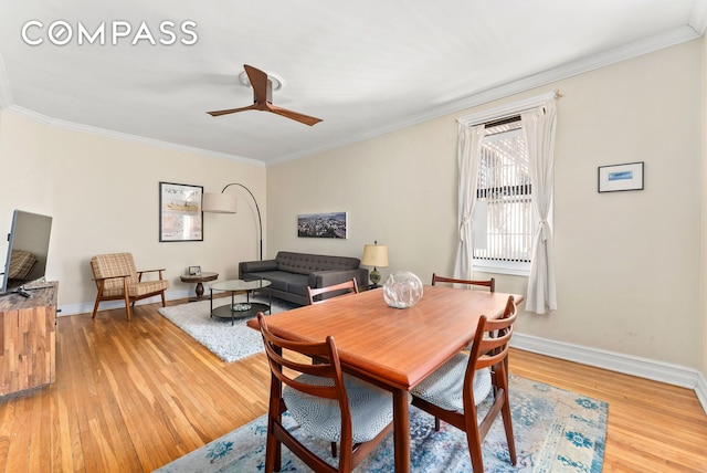 675 Academy St Unit 3A, New York City, NY 10034 - dining room with light wood-type flooring, ornamental molding, ceiling fan, and baseboards
