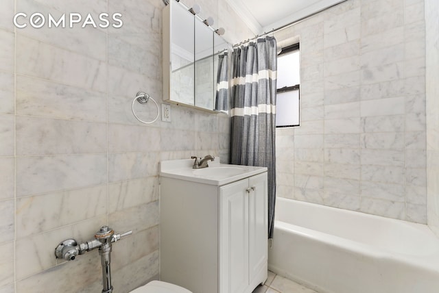 675 Academy St Unit 3A, New York City, NY 10034 - full bathroom featuring vanity, shower / bath combination with curtain, tile patterned floors, tile walls, and toilet