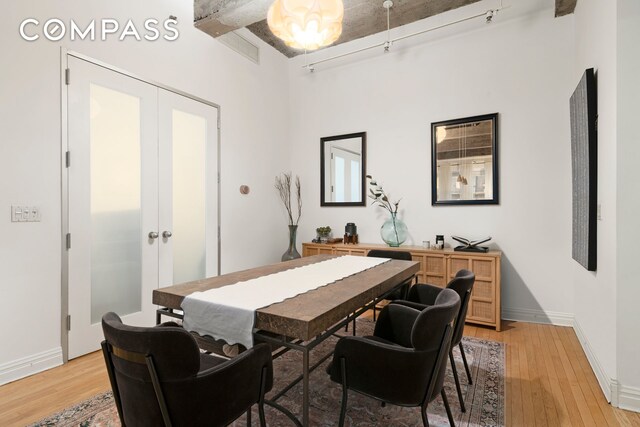 419 W 55th St Unit 2D, New York City, NY 10019 - office space with light wood finished floors, baseboards, and track lighting