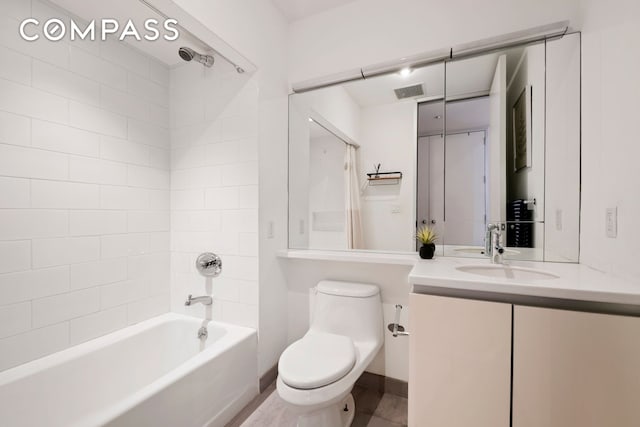 full bath with visible vents, shower / tub combo with curtain, vanity, and toilet