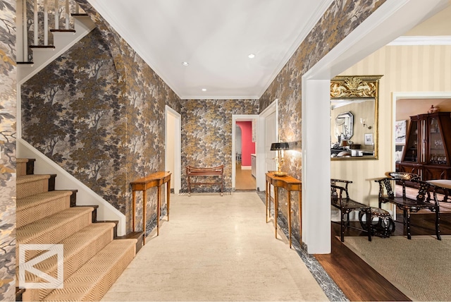hall with stairs, recessed lighting, wallpapered walls, and ornamental molding