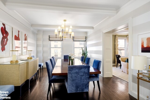dining room featuring dark wood-style floors, a chandelier, plenty of natural light, crown molding, and beamed ceiling