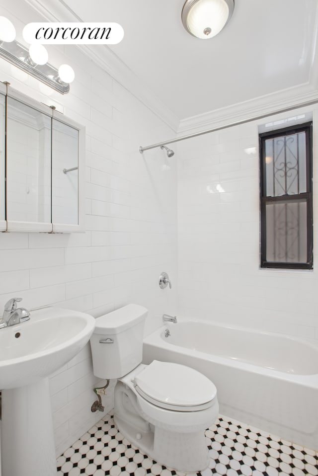 24-65 38th St Unit A5, New York City, NY 11103 - bathroom featuring toilet, shower / tub combination, tile patterned flooring, tile walls, and ornamental molding