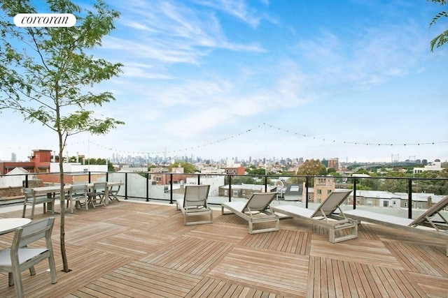 24-65 38th St Unit A5, New York City, NY 11103 - wooden deck featuring outdoor dining area