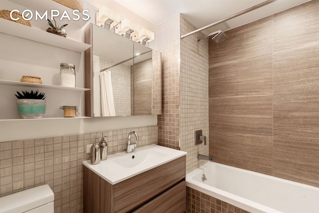 954 Bergen St Unit 5D, New York City, NY 11216 - full bath featuring tile walls, vanity, tiled shower / bath, and tasteful backsplash