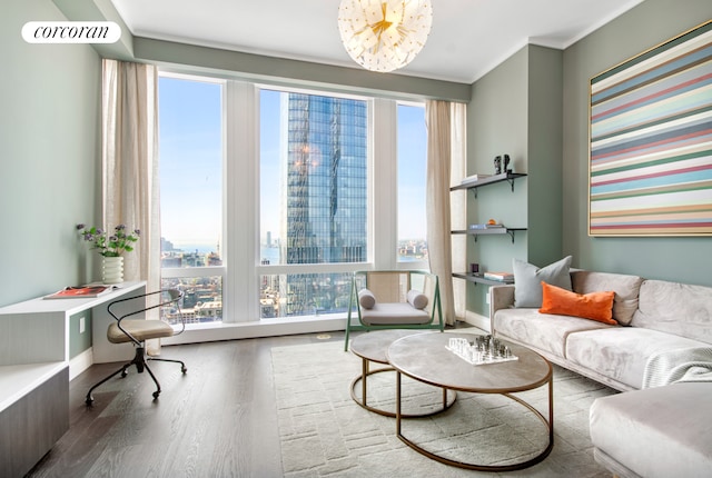 35 Hudson Yards Unit 5504, New York City, NY 10001 - living room featuring wood finished floors, crown molding, a view of city, and baseboards