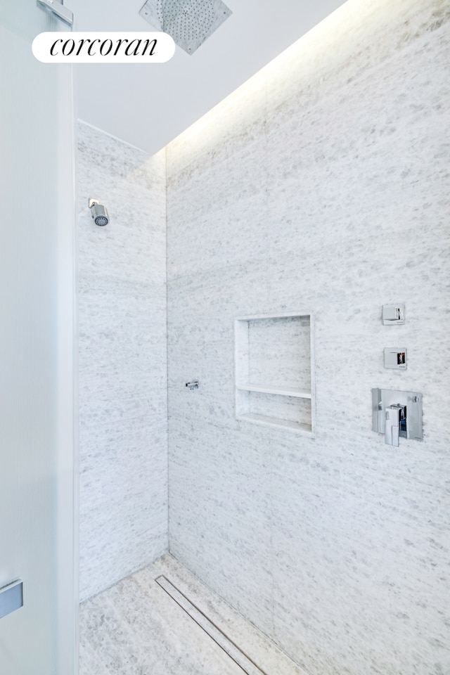35 Hudson Yards Unit 5504, New York City, NY 10001 - full bath featuring a tile shower