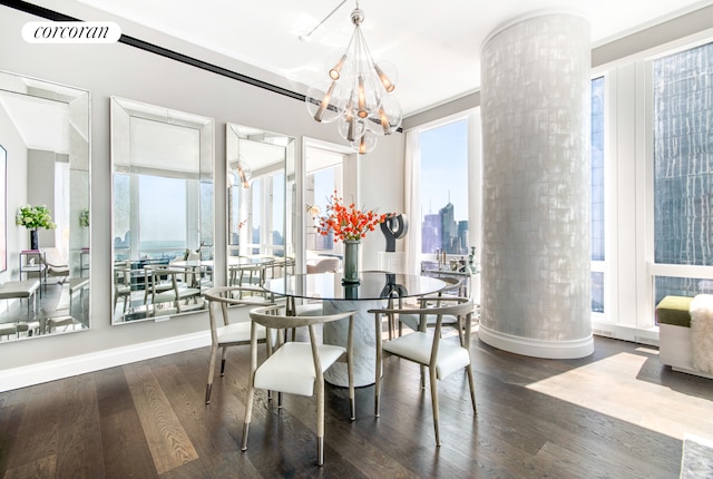 35 Hudson Yards Unit 5504, New York City, NY 10001 - dining room featuring healthy amount of natural light, wood finished floors, baseboards, and a chandelier