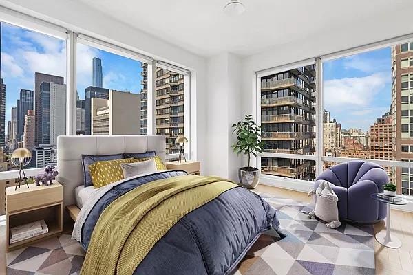 845 United Nations Plz Unit 7-H, New York City, NY 10017 - bedroom with a skyline view