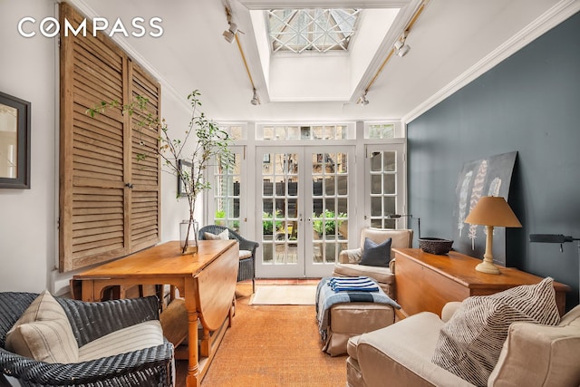 interior space featuring track lighting and french doors