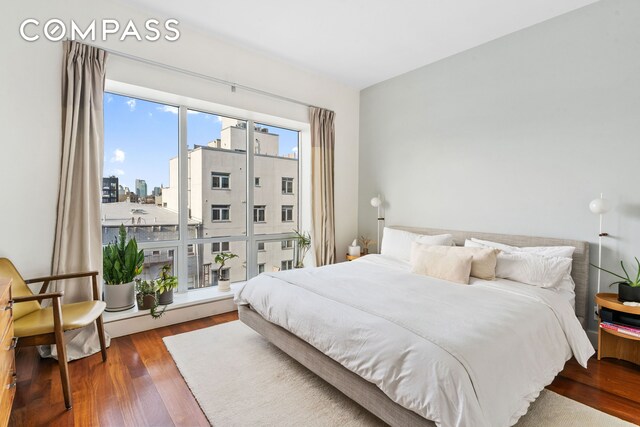 131 Jackson St Phb, Phb, New York City, NY 11211 - bedroom featuring wood finished floors and a city view