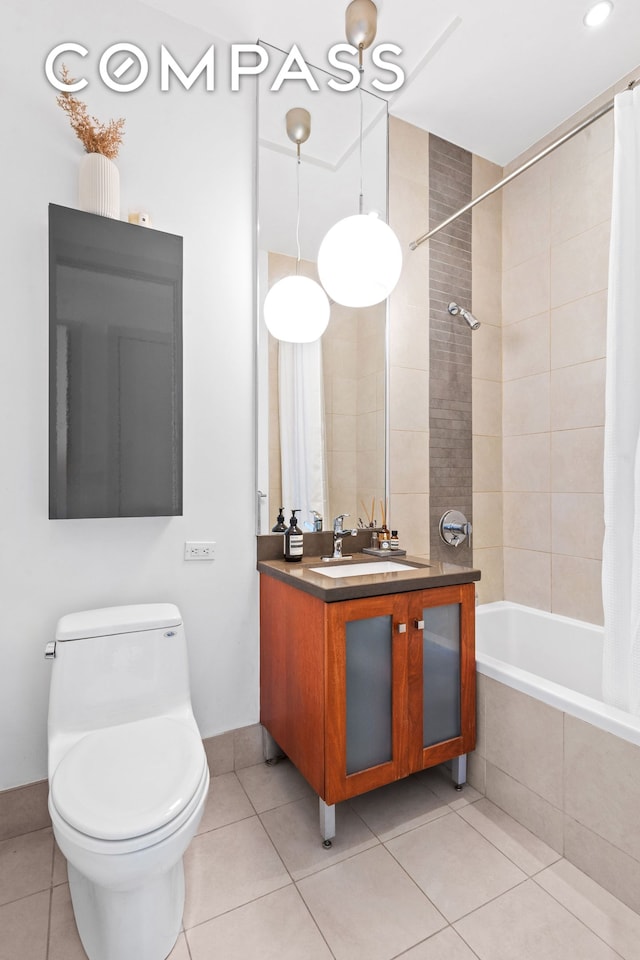 131 Jackson St Phb, Phb, New York City, NY 11211 - bathroom with tile patterned floors, toilet, tiled shower / bath combo, and vanity