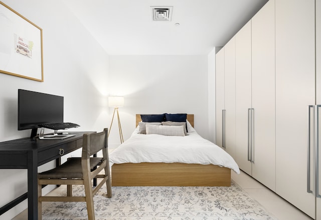 111 Fulton St Unit 318, New York City, NY 10038 - bedroom with light tile patterned floors