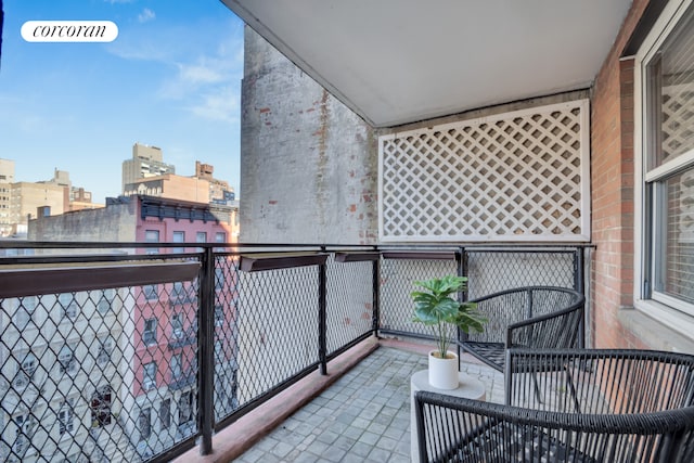 balcony featuring a view of city
