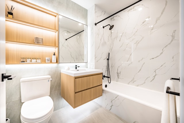 37-34 33rd St Unit 2-B, New York City, NY 11101 - full bathroom with toilet, vanity, a combined bath / shower with marble appearance, and marble finish floors