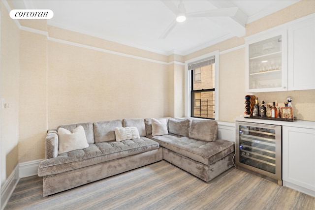 545 W End Ave Unit 7Ef, New York City, NY 10024 - living area with visible vents, ornamental molding, wine cooler, ceiling fan, and a dry bar