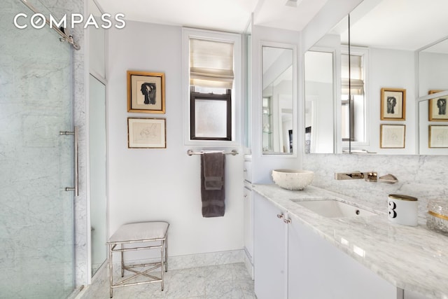 65 E 96th St Unit 15D, New York City, NY 10128 - full bath with vanity, an enclosed shower, decorative backsplash, and baseboards