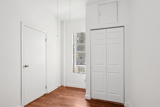 137 W 142nd St Unit 3A, New York City, NY 10030 - unfurnished bedroom featuring wood finished floors and baseboards