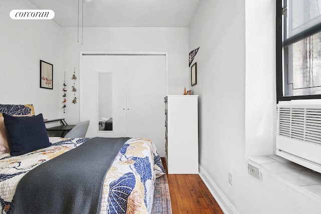 55 Hicks St Unit 3, New York City, NY 11201 - bedroom featuring hardwood / wood-style flooring, a closet, and baseboards