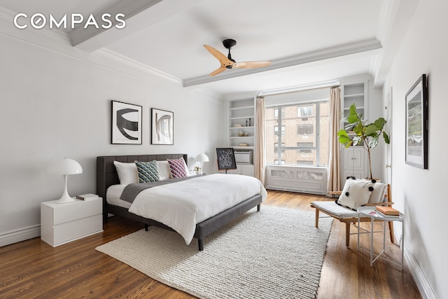 180 E 79th St Unit 14G, New York City, NY 10075 - bedroom with crown molding, beam ceiling, wood finished floors, baseboards, and a ceiling fan