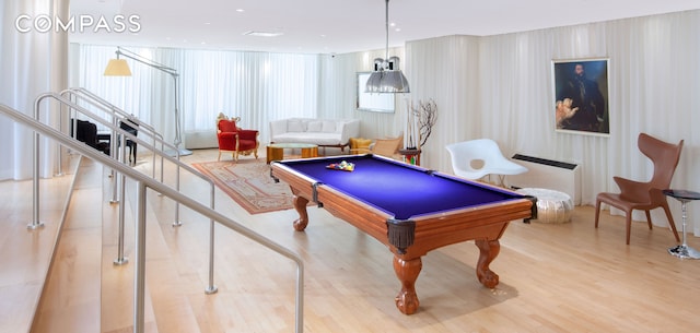 recreation room featuring billiards and wood finished floors