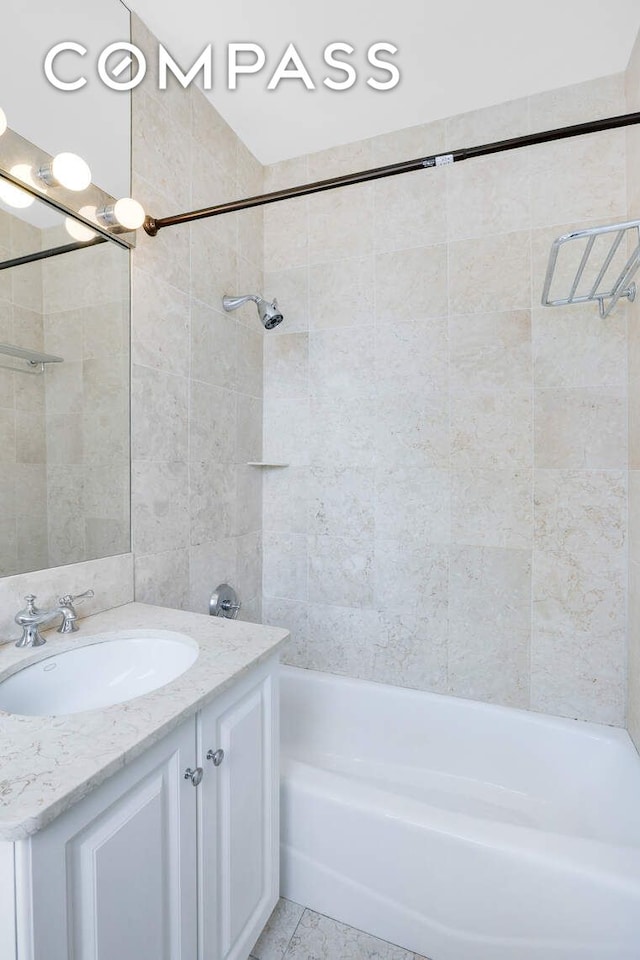 full bathroom featuring vanity and shower / bathtub combination