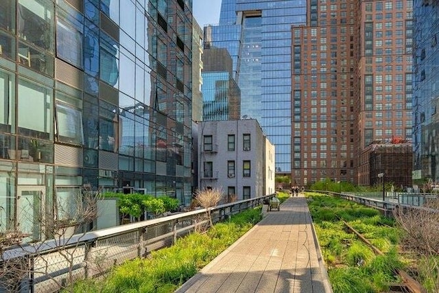 200 W 20th St Unit 1213, New York City, NY 10011 - view of home's community with a view of city and fence