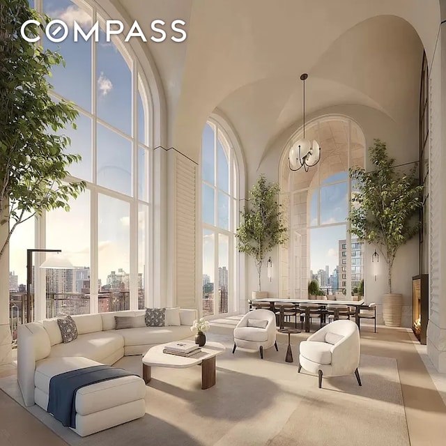 200 E 83rd St Unit 24C, New York City, NY 10028 - common area featuring a towering ceiling and a skyline view