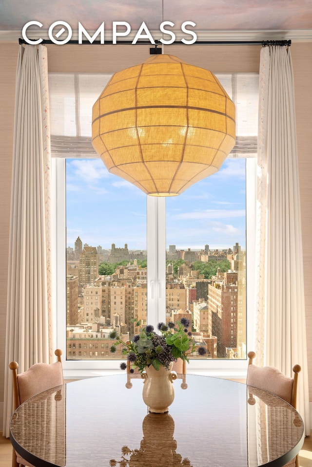 200 E 83rd St Unit 24C, New York City, NY 10028 - dining space with a city view