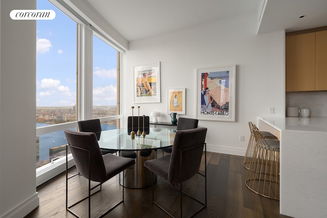 35 Hudson Yards Unit 7403, New York City, NY 10001 - dining space with wood finished floors and baseboards