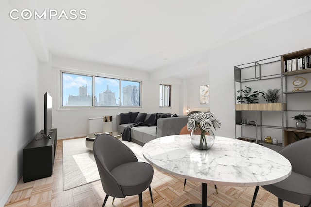dining room with baseboards
