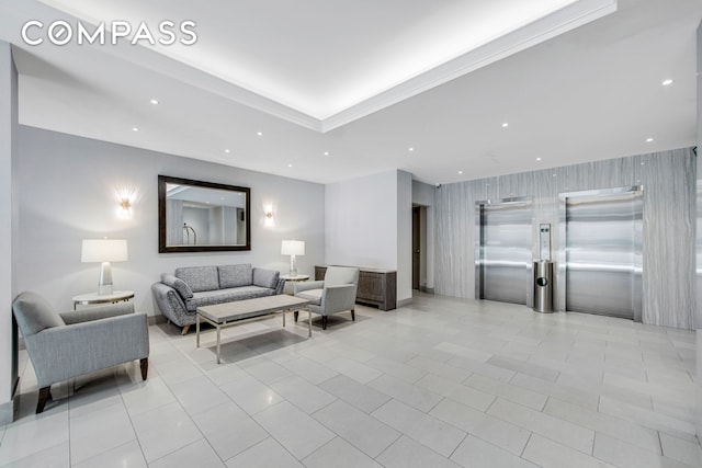 lobby with recessed lighting and wallpapered walls