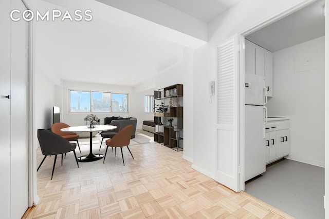 dining room with baseboards