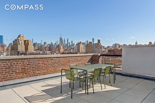 view of patio / terrace with a view of city