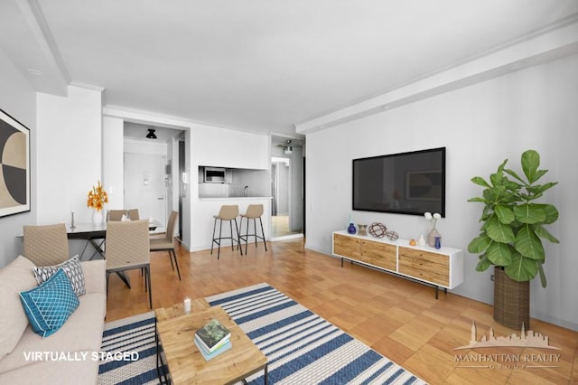 living area with wood finished floors
