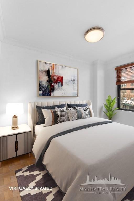 bedroom featuring crown molding