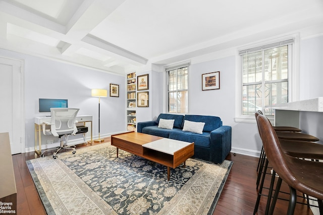 155 E 49th St Unit 1A, New York City, NY 10017 - living area featuring dark wood finished floors, coffered ceiling, beamed ceiling, an office area, and baseboards