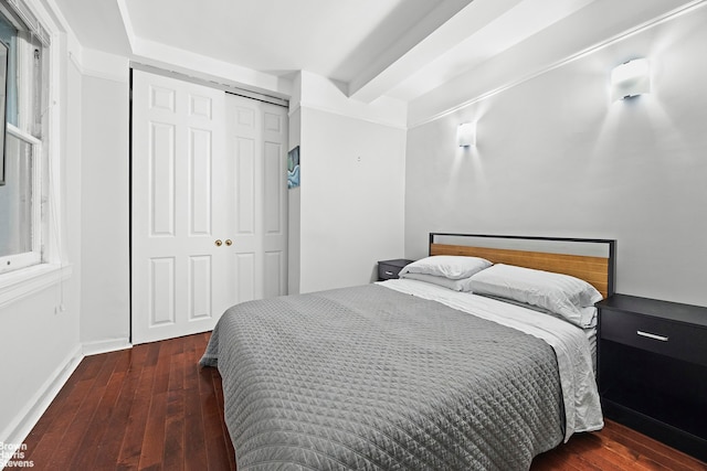 155 E 49th St Unit 1A, New York City, NY 10017 - bedroom featuring hardwood / wood-style floors, a closet, and baseboards