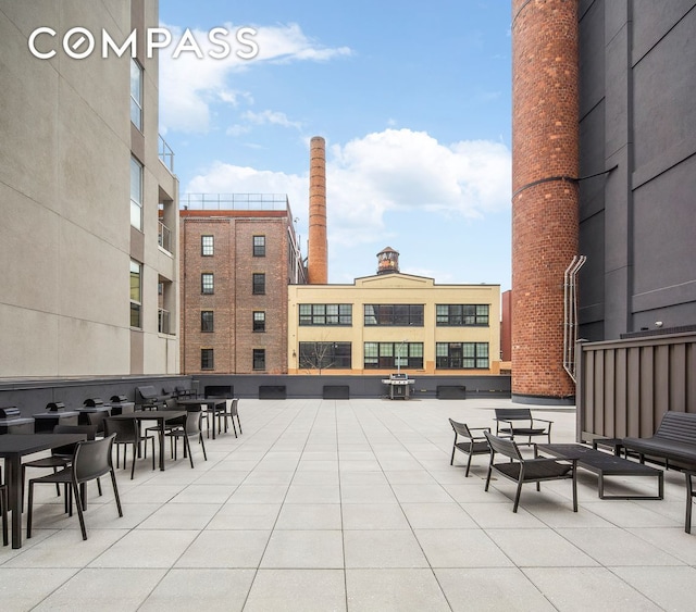 view of patio / terrace with outdoor dining area and area for grilling