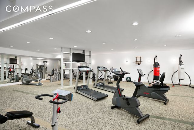 exercise room with recessed lighting