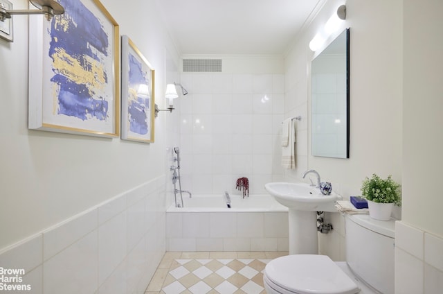 bathroom with toilet, tile patterned flooring, and visible vents