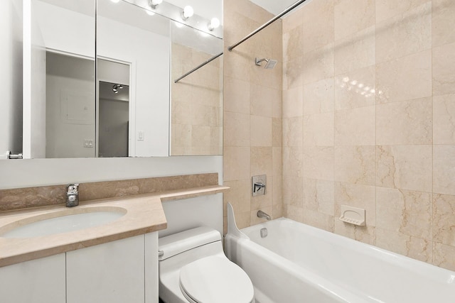 full bathroom featuring vanity, toilet, and shower / tub combination