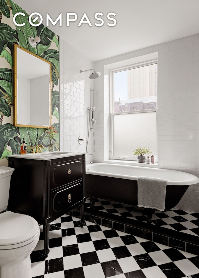 130 Fort Greene Place, New York City, NY 11217 - bathroom featuring tile patterned floors, toilet, and vanity