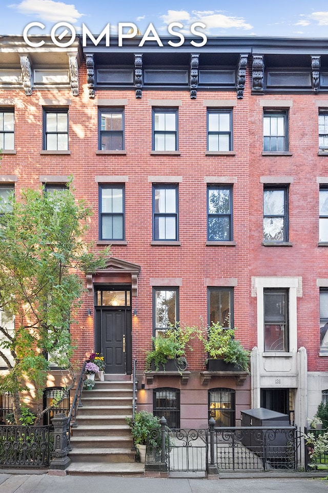130 Fort Greene Place, New York City, NY 11217 - view of apartment building / complex with a fenced front yard